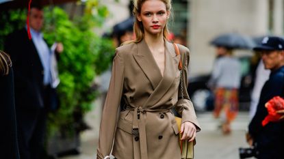 Street fashion, Clothing, Fashion, Fashion model, Outerwear, Coat, Shoulder, Trench coat, Blazer, Dress, 