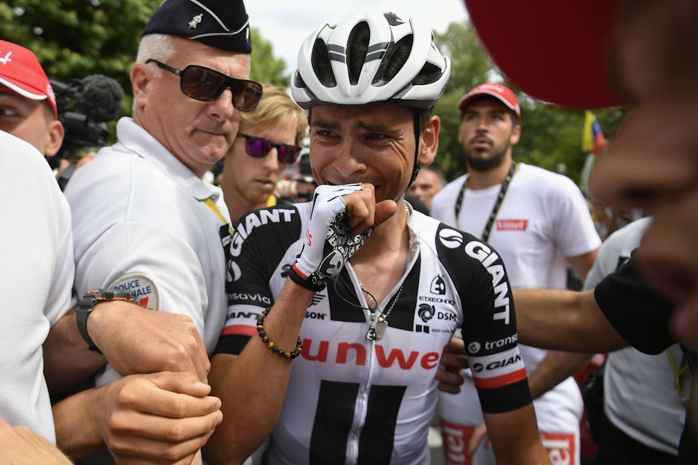 Warren Barguil is emotional after the photo finish during stage 9