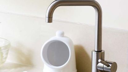 kitchen sink with built in granite and steel tap