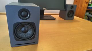 Audioengine A1-MR on a wooden surface