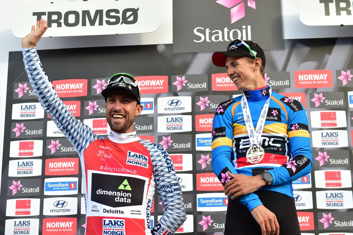 KOM winner Bernie Eisel and Dylan Teuns (BMC) smiling on the final podium