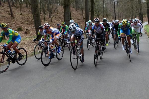 An attack from several riders simultaneously on the climb caused an acceleration, but no break in the front group