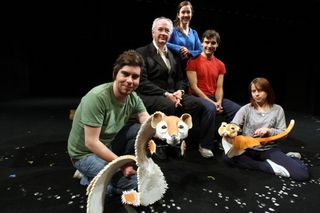 Philip Pullman with some of the actors who starred in His Dark Materials at the Playhouse Theatre in Oxford