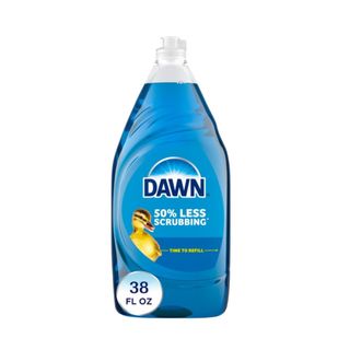 A bottle with bright blue liquid in it with blue writing that says 'Dawn' and a photograph of a yellow duckling