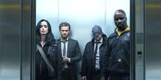 The Defenders in the elevator