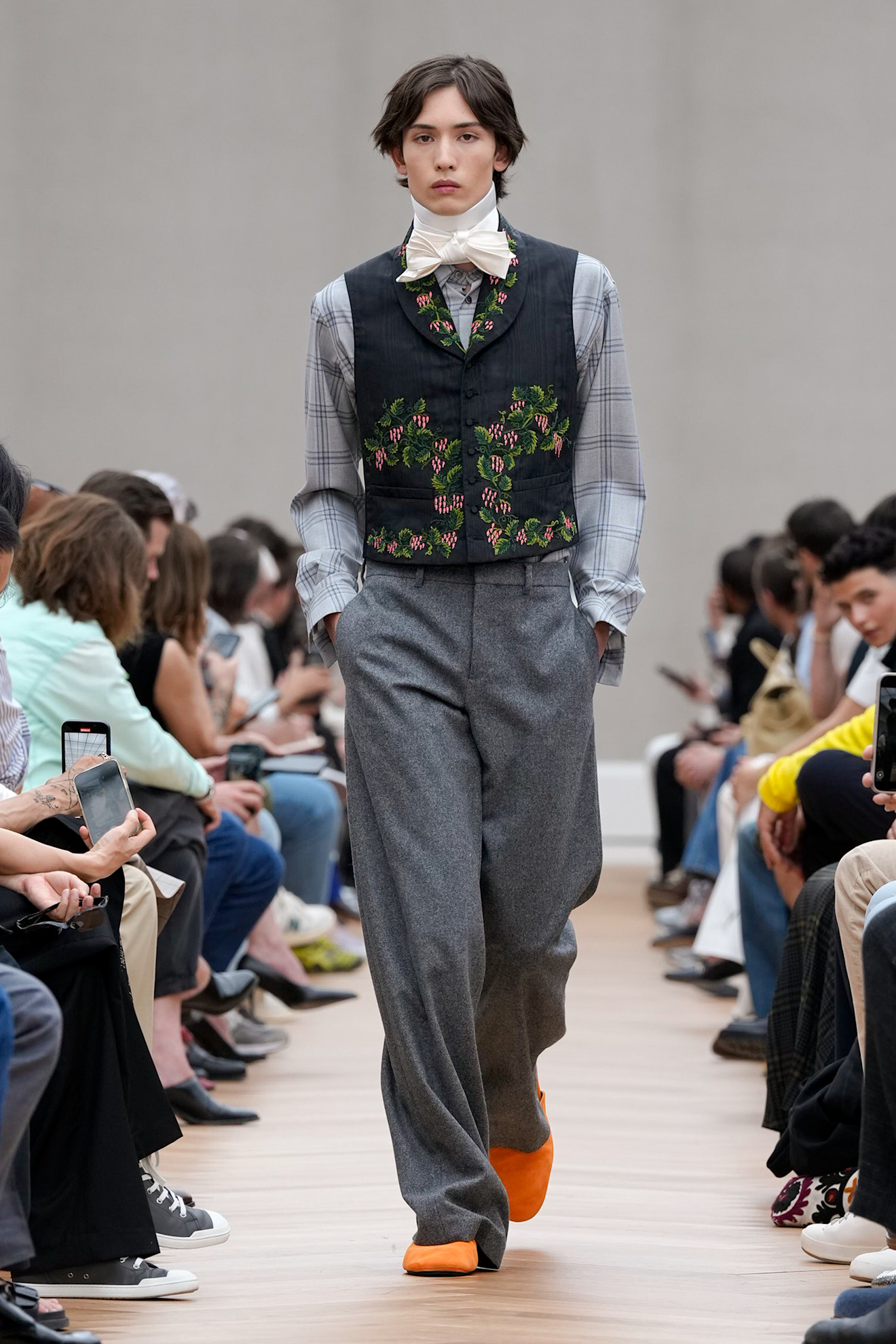 A model wore a floral vest on the Dior Spring 2026 runway