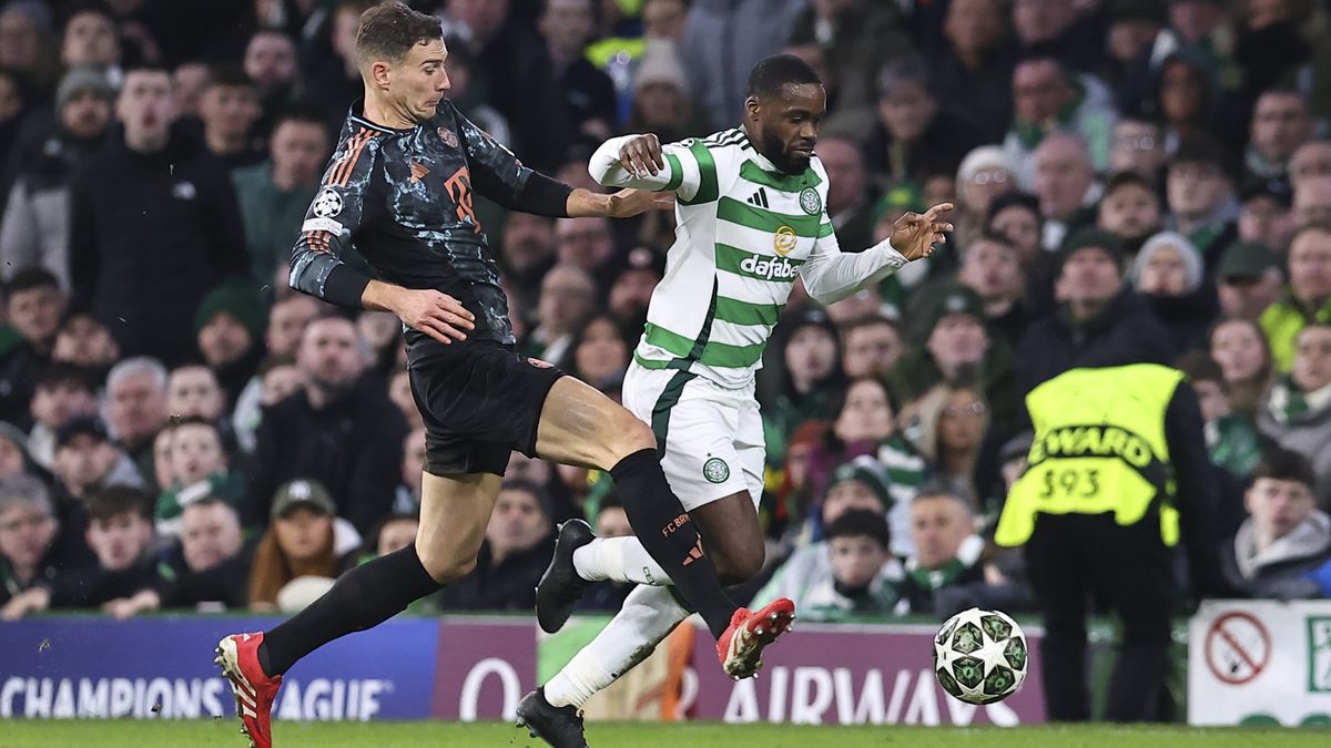 Leon Goretzka of FC Bayern Munich and Jeffrey Schlupp of Celtic FC battle for the ball during the UEFA Champions League 2024/25 League Knockout Play-off First Leg match between Celtic FC and FC Bayern Munich