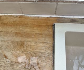 wooden countertop with water stains