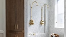 double brass shower with timber cabinetry