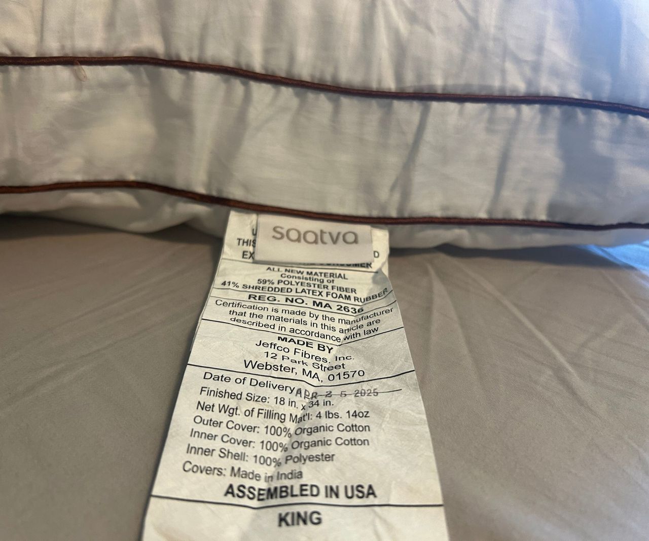 Images of the Saatva Latex pillow close up and from the side to demonstrate testing for a review