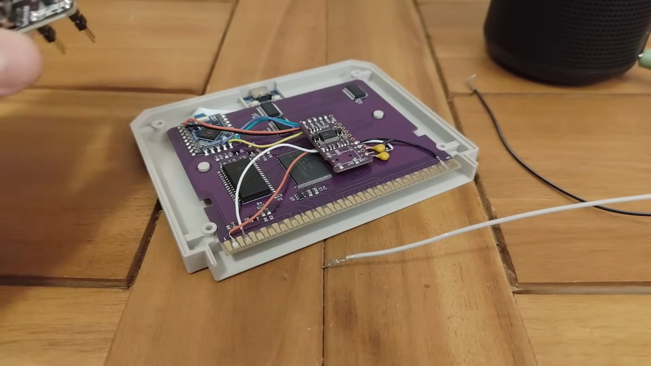 Casio Loopy "Loopy Drive" flash cart with shell open and mods soldered in place.