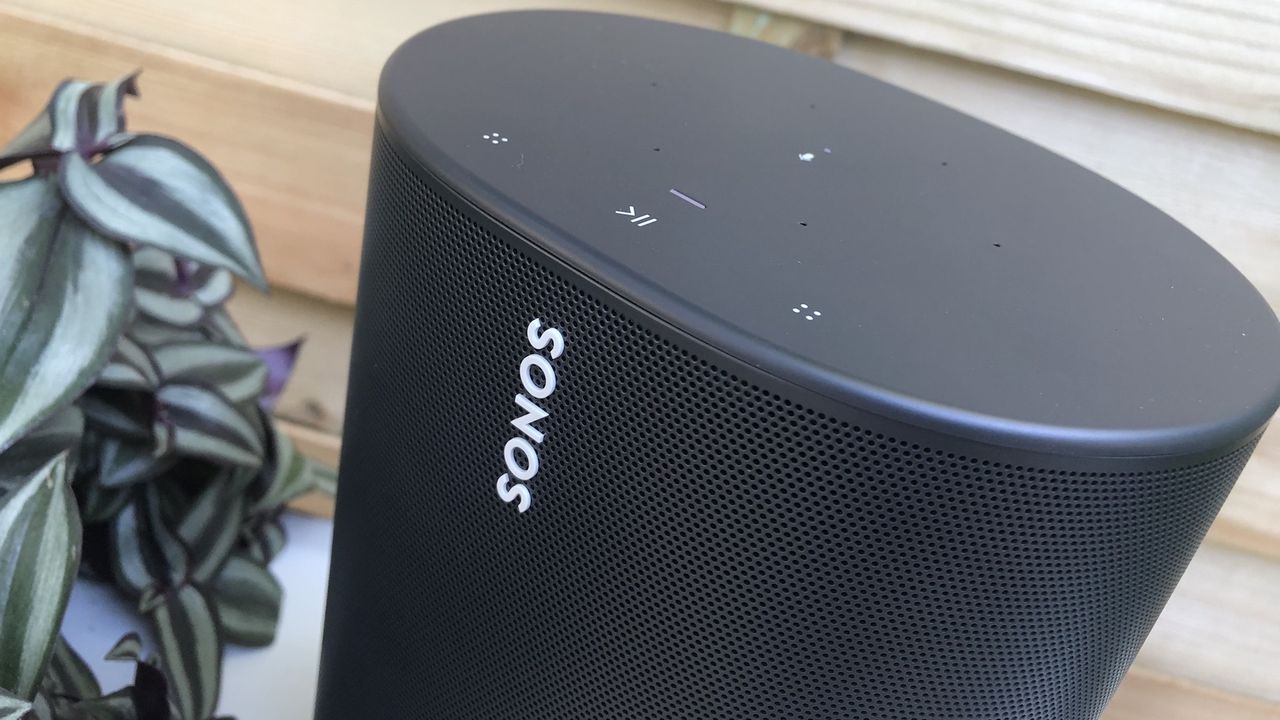 A close-up of the top of a black Sonos Move speaker. Some of the controls on top are just about visible.
