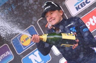 Christine Siggaard celebrates her win at Omloop Het Nieuwsblad