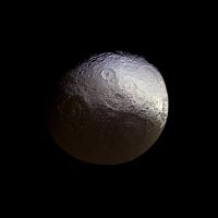 This image taken by the Cassini spacecraft shows what the two-tone surface of the moon Iapetus looks like without false color. Cassini examined Iapetus for about a week in early 2015, in a campaign partly dedicated to further investigating subtle color differences within the moon's bright terrain.
