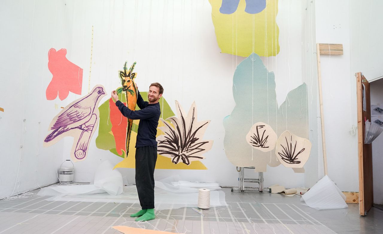 Artist Petrit Halilaj in his Berlin studio with elements of his 2021 Tate St Ives exhibition, ‘Very volcanic over this green feather’