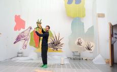 Artist Petrit Halilaj in his Berlin studio with elements of his 2021 Tate St Ives exhibition, ‘Very volcanic over this green feather’