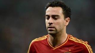 Spanish midfielder Xavi Hernandez looks on during the Euro 2012 football championships quarter-final match Spain vs France on June 23, 2012 at the Donbass Arena in Donetsk. AFP PHOTO / FRANCK FIFE (Photo by Franck FIFE / AFP) (Photo by FRANCK FIFE/AFP via Getty Images)