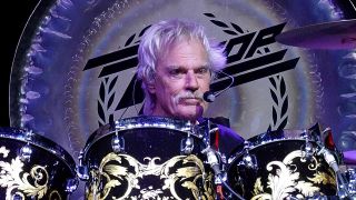 Frank Beard onstage in 2023