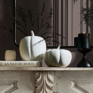 Two ceramic pumpkin decorations from West Elm