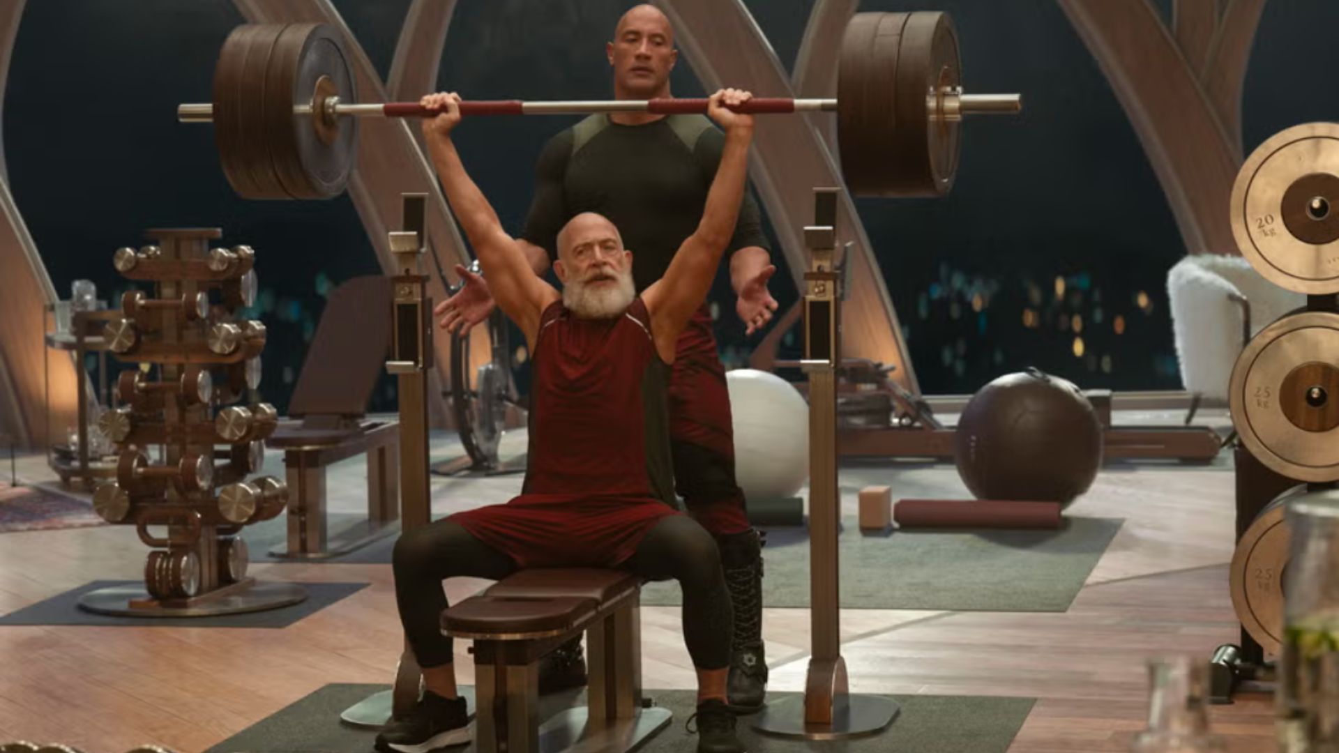 an image of J K Simmons in character as Santa training with Dwayne the rock johnson