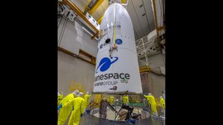 The James Webb Space Telescope is being encapsulated into the fairing of the Ariane 5 rocket that will send it for its journey of ground-breaking discoveries.