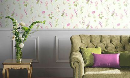 wallpaper on wall with sofa and cushions