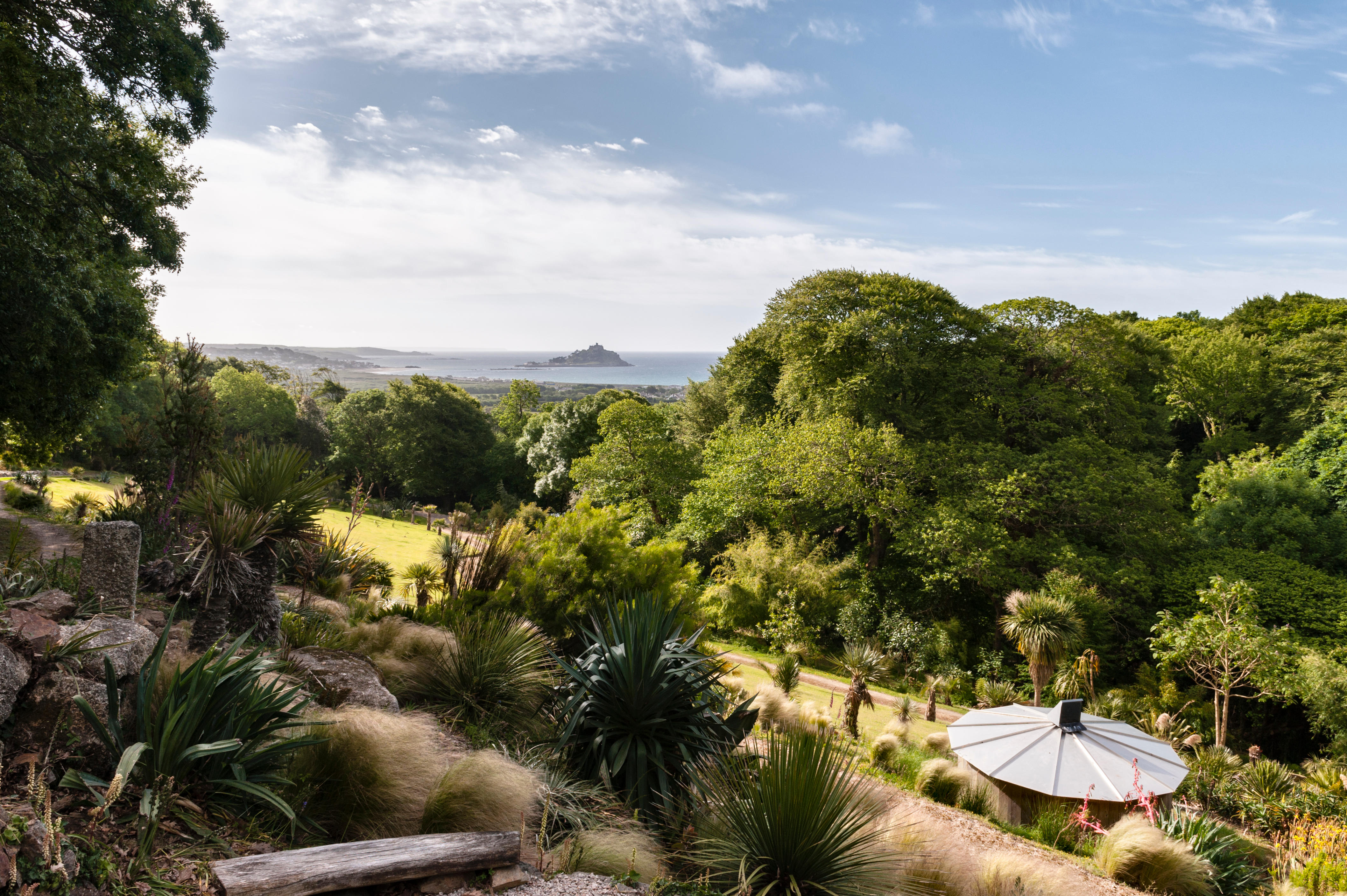 Tremenheere Sculpture Gardens, Cornwall. The camera obscura is by the artist Billy Wynter. St Michael's Mount in the distance.