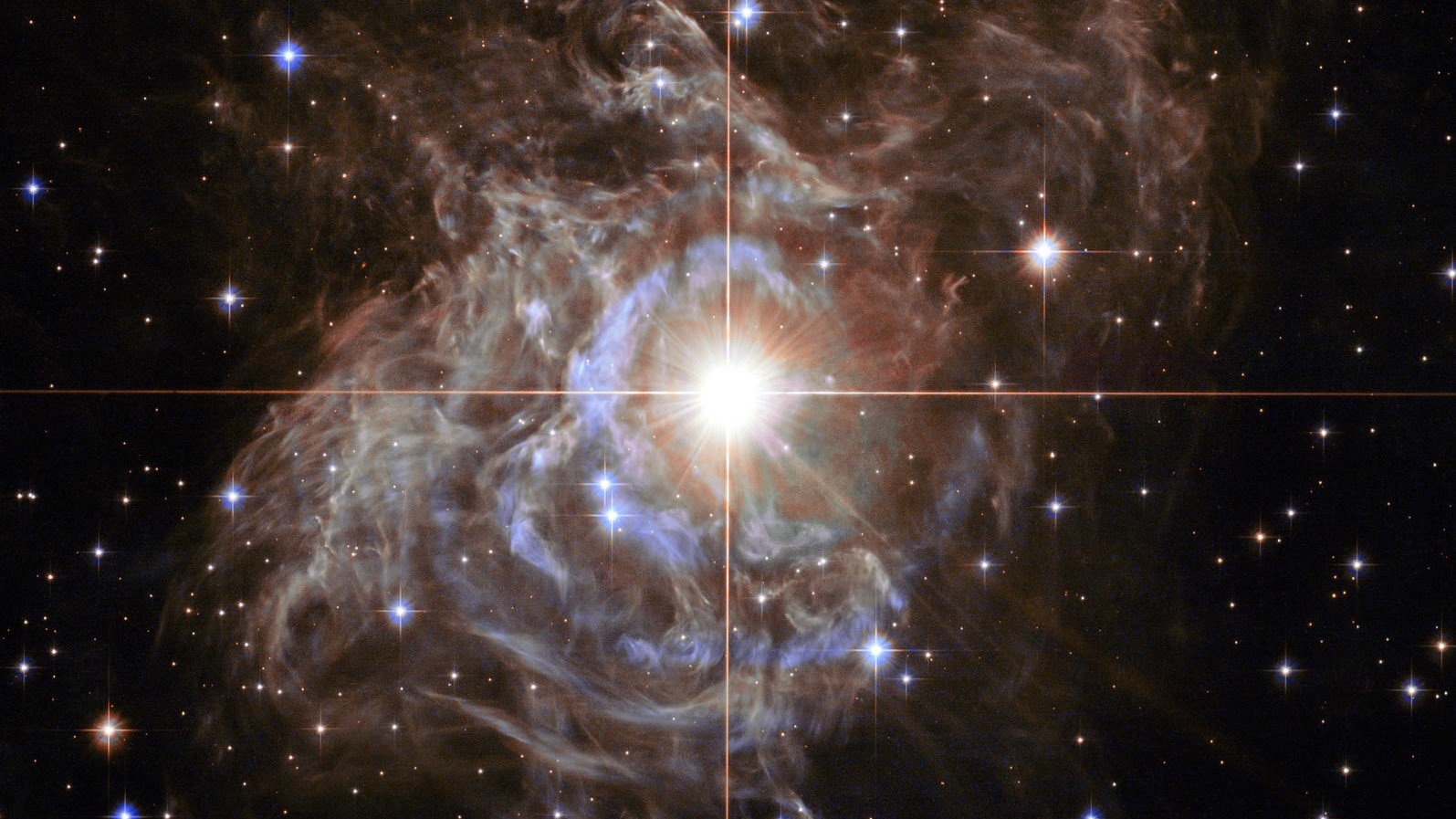 RS Puppis, a Cepheid star located 6,000 light-years away in the constellation Puppis and imaged by the Hubble Space Telescope..