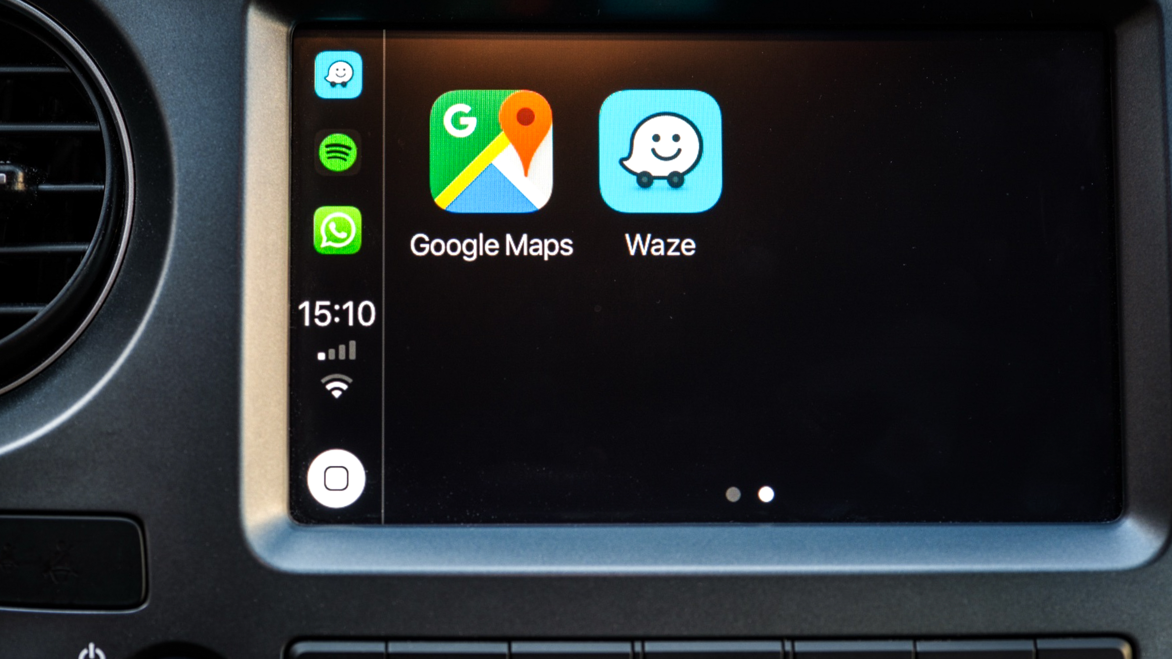 Google Maps and Waze icons on dashboard computer display