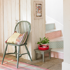 colourful staircase with wooden side wall