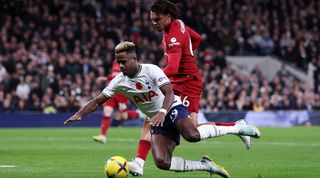 Liverpool's Trent Alexander-Arnold pushes Tottenham's Ryan Sessegnon off the ball during the teams' Premier League clash in north London.