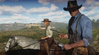 Arthur Morgan and Sadie ride horses in Red Dead Redemption 2