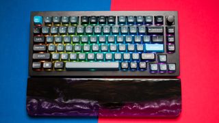 Keychron Q1 Pro with resin wrist rest on red and blue background
