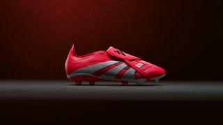 Side on view of the all new Adidas Predator 25 in Red and White