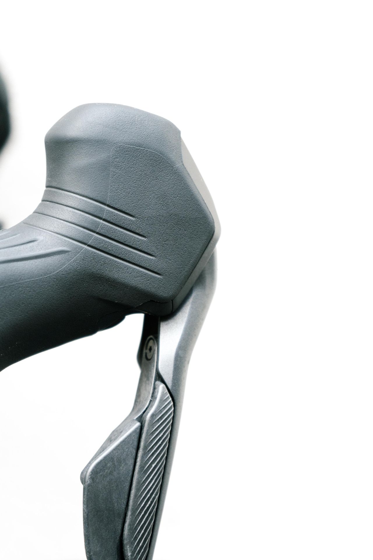 A close up of a grey shifter hood