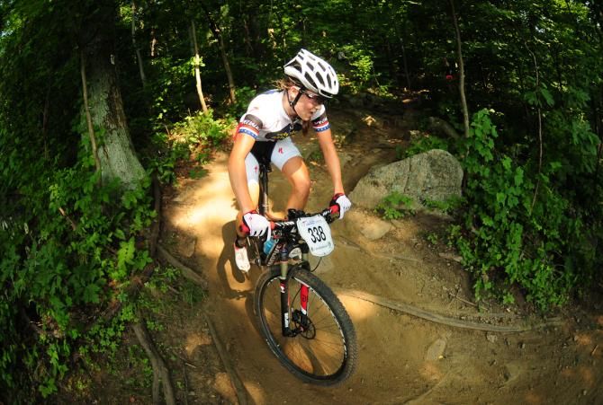 Kate Courtney (Whole Athlete) riding some sweet singletrack on her way to victory in the 17-18 race