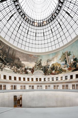 The central dome and mural around it are one of the Bourse's most defining building features