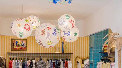 Bespoke hand-painted paper lanterns hung up in Rixo flagship store