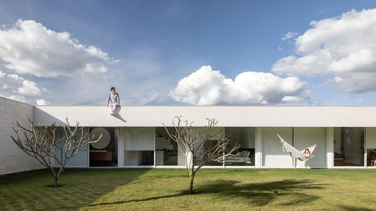 White Bricks House by BLOCO Arquitetos is a modern courtyard house