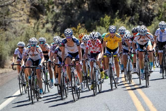 Team Exergy and NOW and Novartis on the front heading into the feed zone.