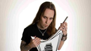 Children Of Bodom’s Alexi Laiho with his white Flying V guitar