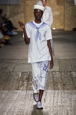 A model walks the runway during Milan Fashion Week spring/summer 2025.