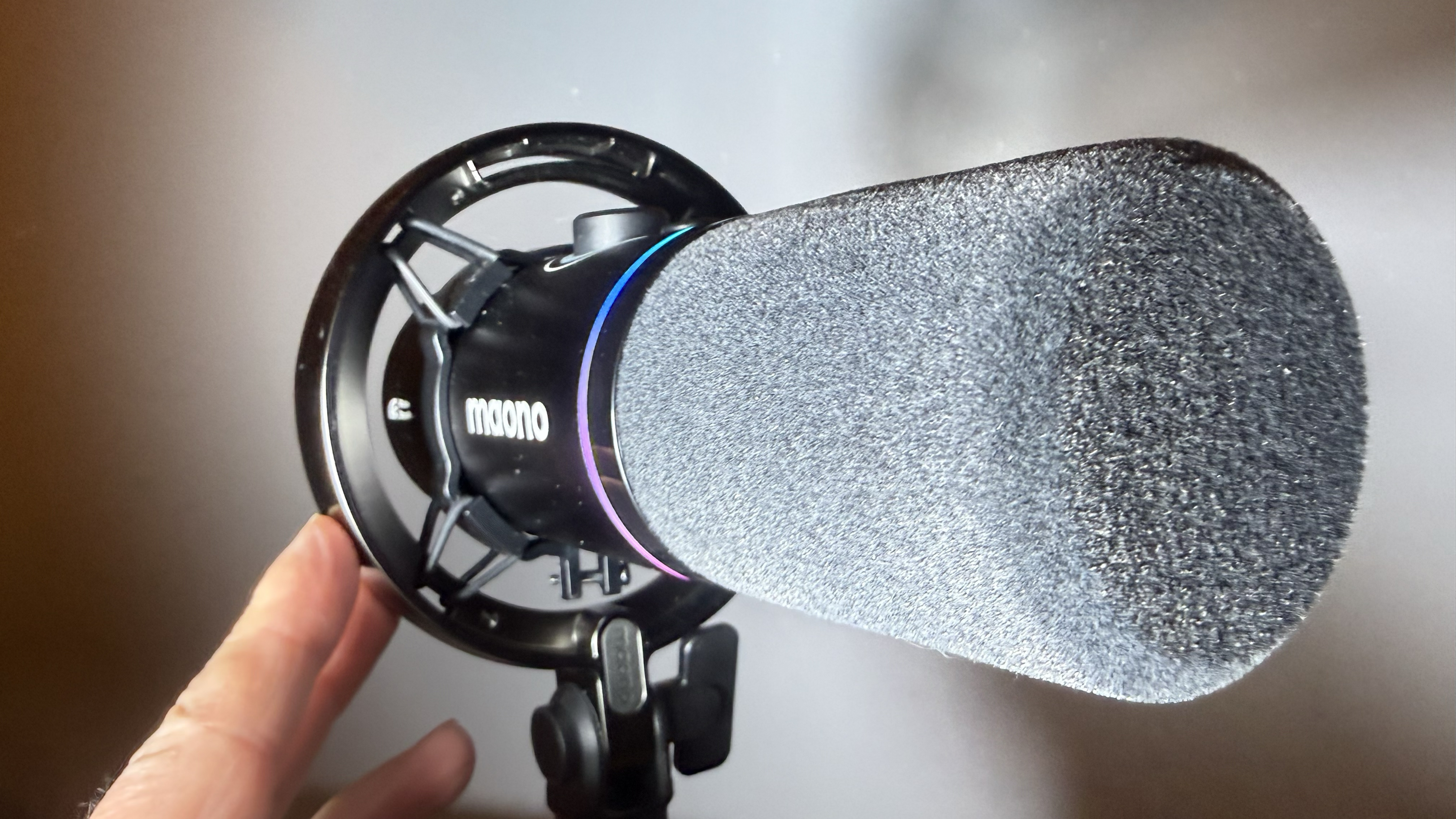 Close-up of the mic&amp;rsquo;s rubber shock mount, that isolates the mic from the metal body of a mic stand to reduce the sounds caused by handling noise