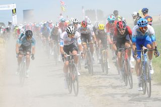 2022 Tour de France: Tadej Pogačar (c) during the Roubaix cobbles stage