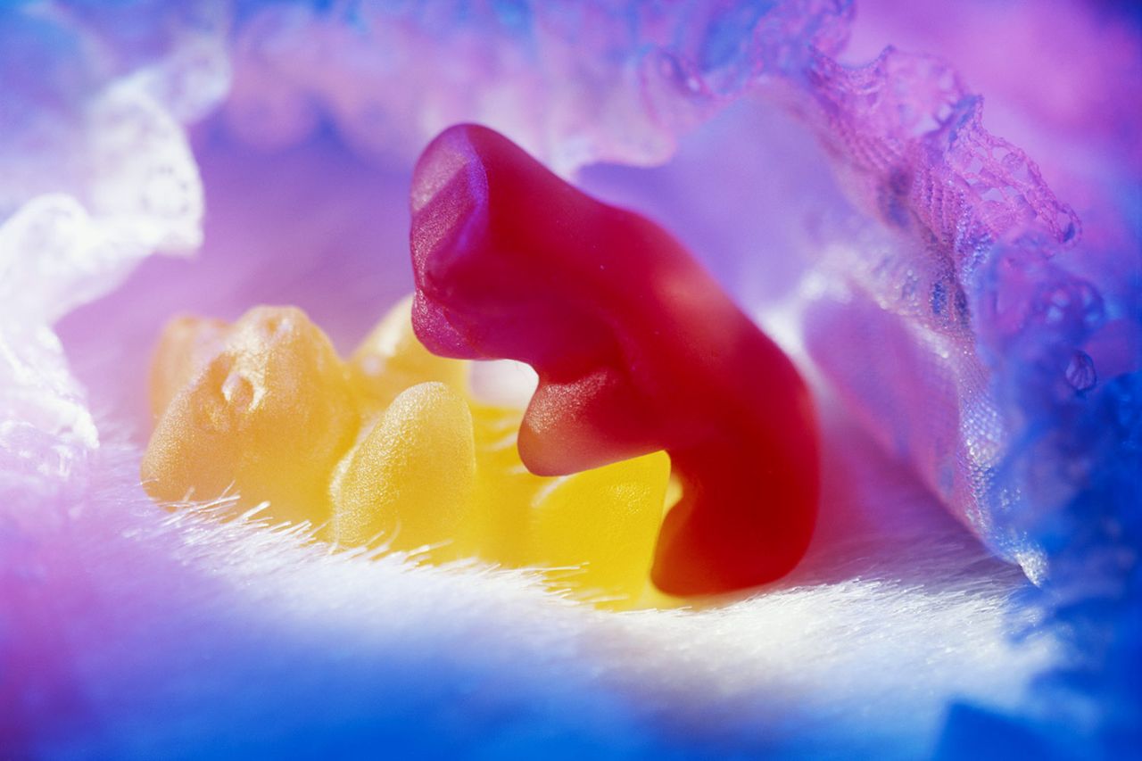 Two bear-shaped sweets &#039;embracing&#039;, close-up