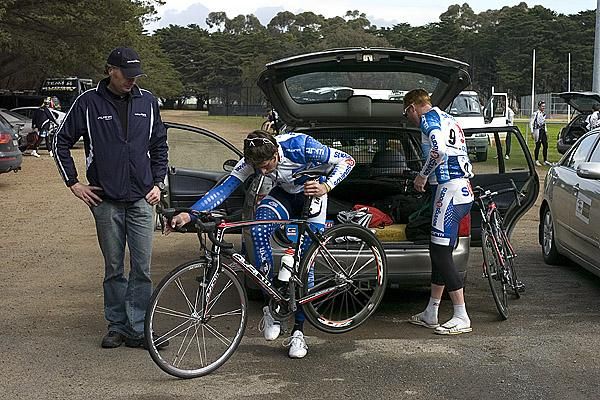 Savings and Loans Andrew Roe puts his bike through some pre-stage tests under the watchful eye of Patrick Jonker (left).