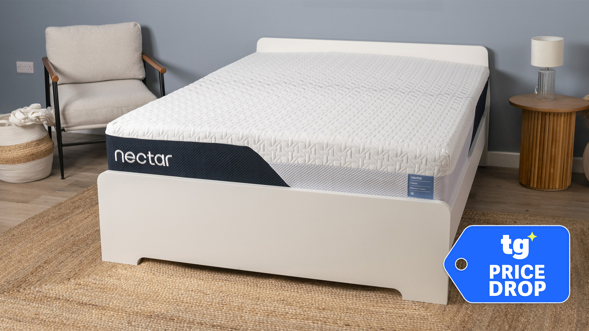 The Nectar Classic Memory Foam mattress on a bed frame in our Sleep Studio, a Tom's Guide price drop deals graphic in the bottom right corner