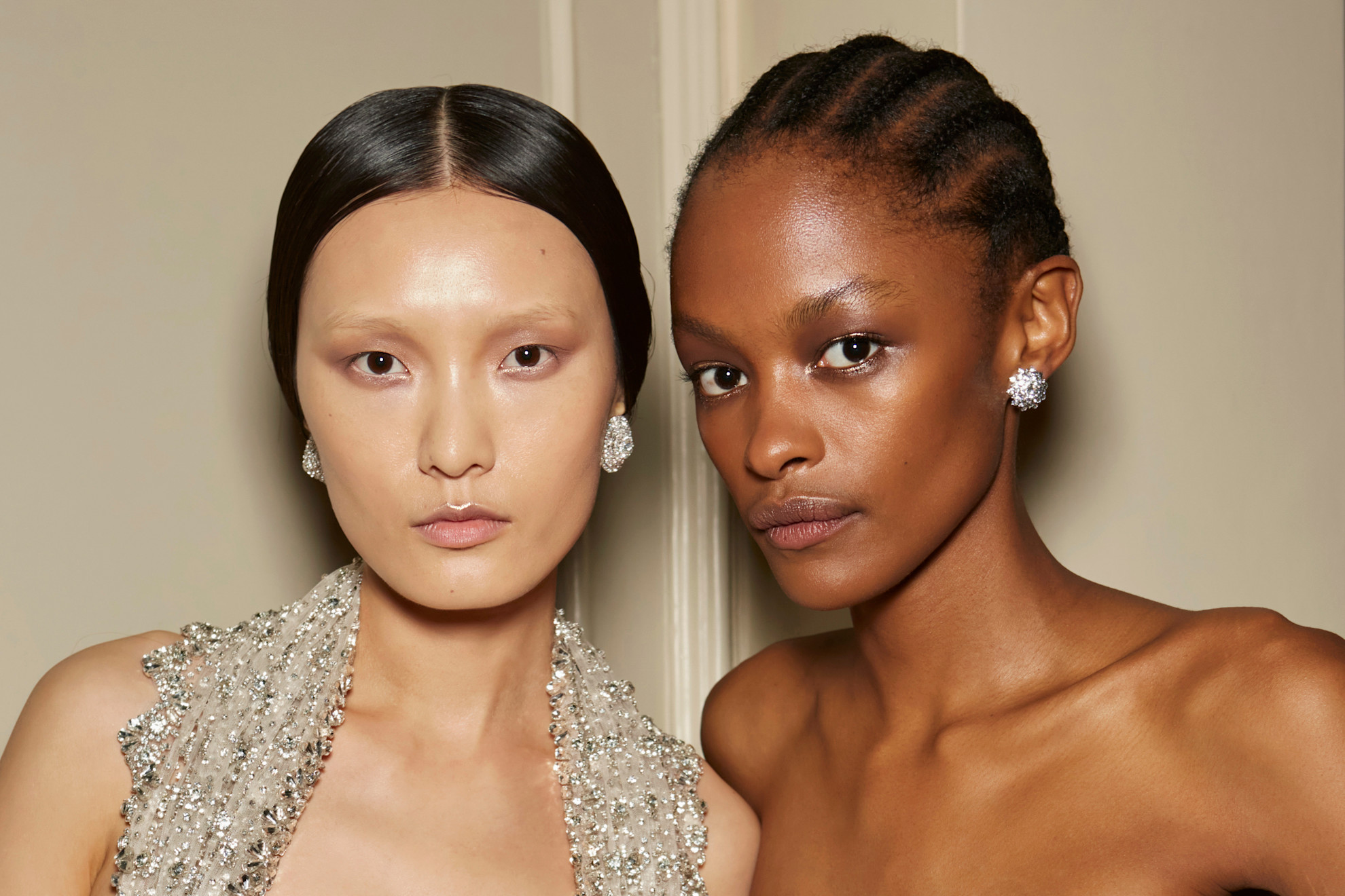 Two models with bright complexions.