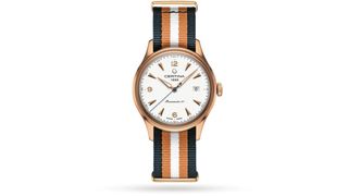 Gold Certina field watch on a white background