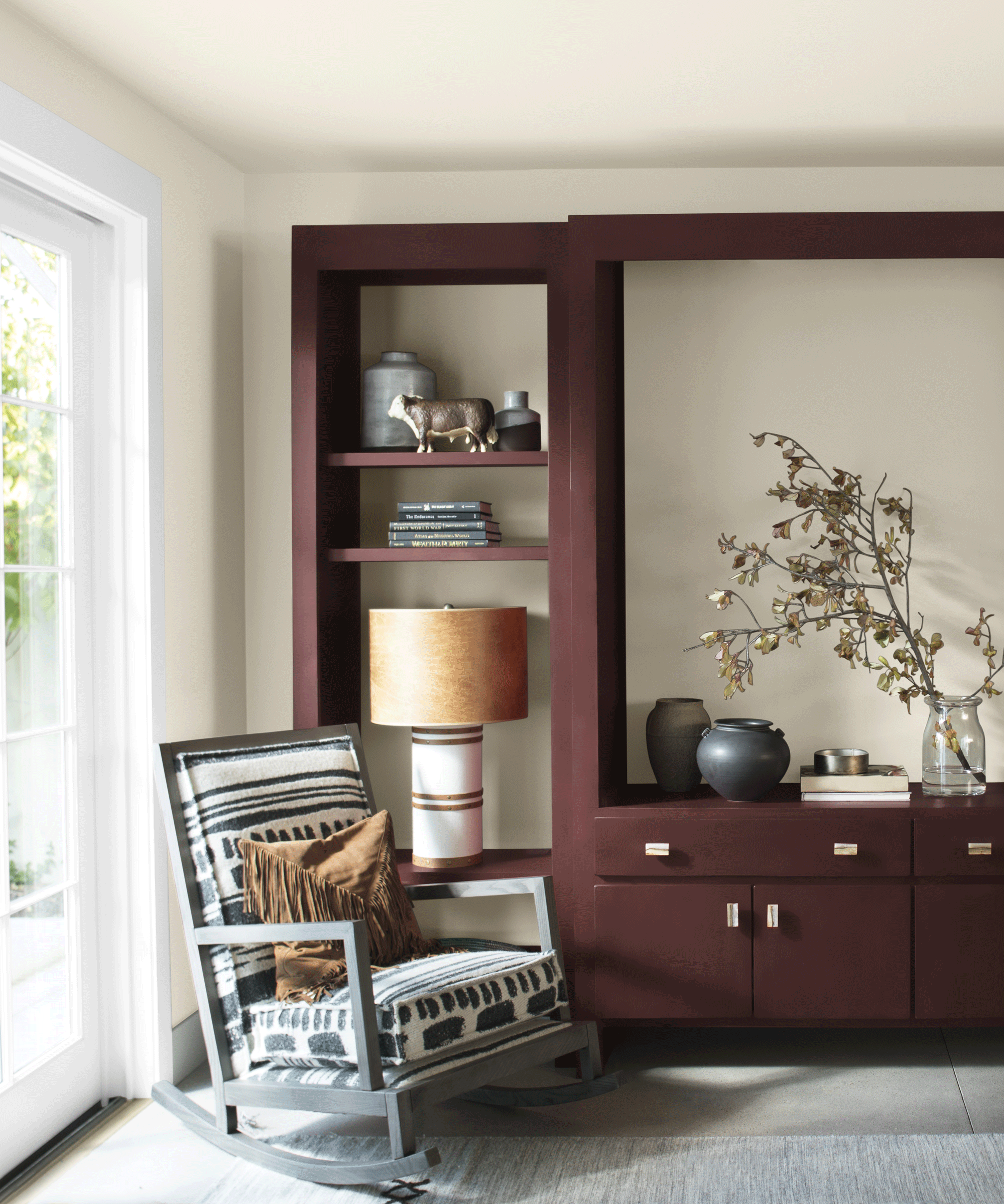 burgundy built in shelving in living area